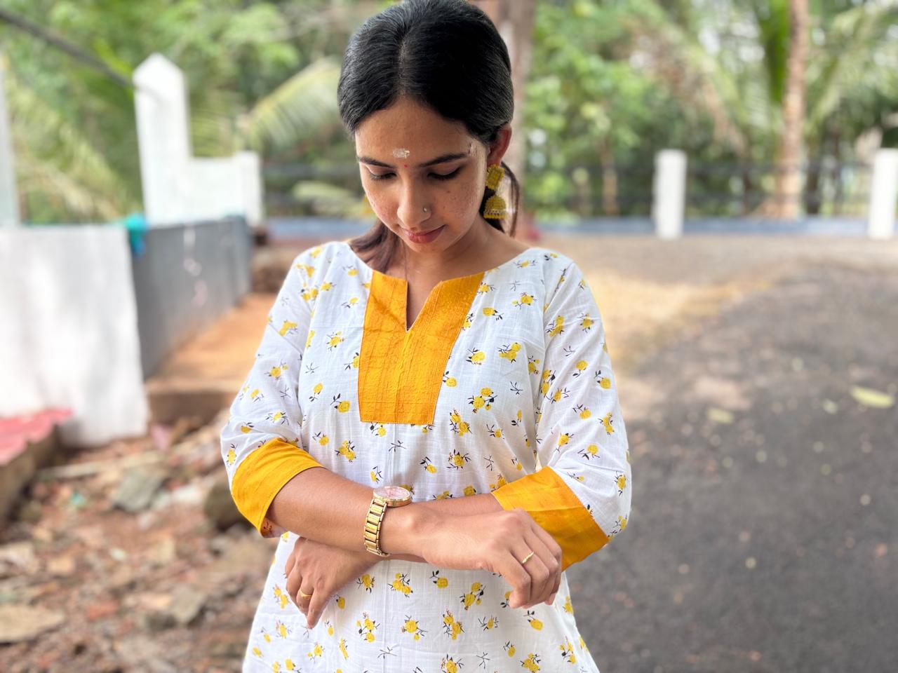 Vishu yellow kurthi